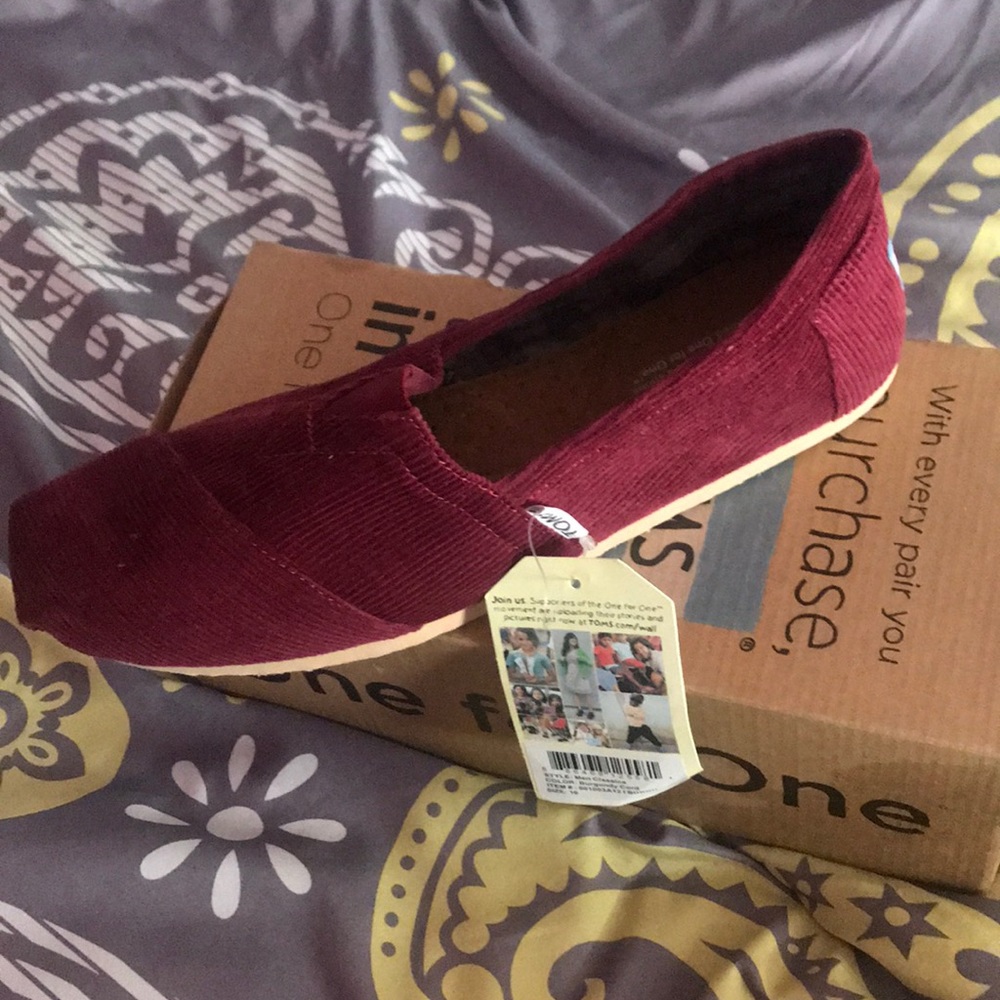 Toms, never worn